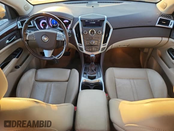 ✅ 2012 Cadillac SRX Luxury Collection • VIN: 3GYFNAE33CS627271 • Lot: 92854265. Wystawiony na Copart z przebiegiem 109 240 mil. Bezpłatny archiwum sprzedaży aukcyjnych z USA i szczegółowy raport historii pojazdu na DreamBid. Zdjęcie 8.