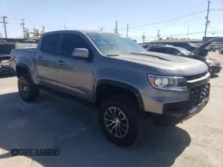 ✅ 2022 Chevrolet Colorado 4WD ZR2 • VIN: 1GCGTEEN4N1310791 • Лот: 70468184. Опубликован ранее на Copart с пробегом 27 006 миль. Бесплатный доступ к архиву аукционных продаж из США и подробный отчёт об истории автомобиля на DreamBid. Изображение 4.