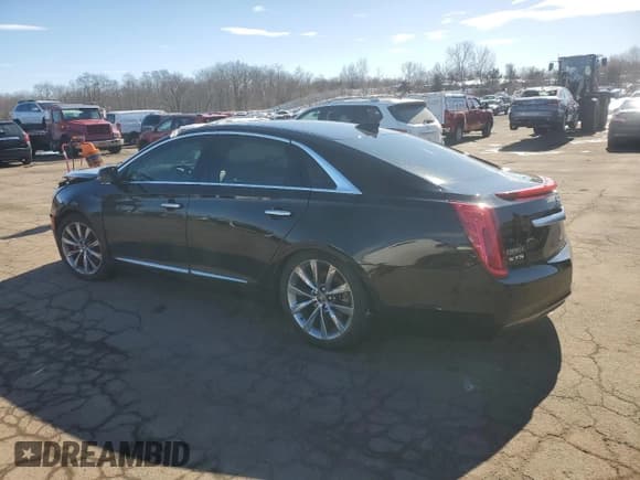 ✅ 2015 Cadillac XTS • VIN: 2G61L5S30F9137845 • Лот: 46112445. Опубликован ранее на Copart с пробегом 94 040 миль. Бесплатный доступ к архиву аукционных продаж из США и подробный отчёт об истории автомобиля на DreamBid. Изображение 2.