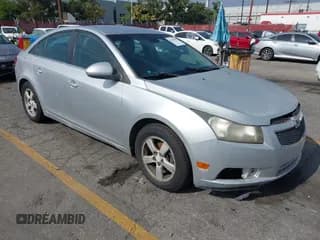 ✅ 2011 Chevrolet Cruze 1FL • VIN: 1G1PE5S91B7253890 • Lot: 43635649. Listed on IAAI with 218,764 mi. Free auction sales archive from the USA and detailed vehicle history report at DreamBid. Image 1.