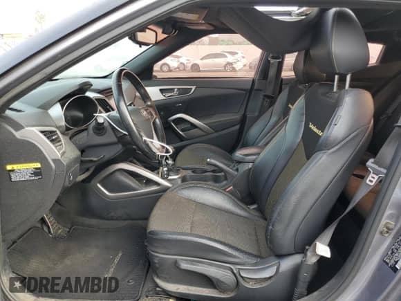 2016 Hyundai Veloster z VIN KMHTC6AD9GU260582, wystawiony jako Copart lot #71878294 z przebiegiem 83 155 mil mil oraz Szkoda całkowita • Salvage title. Historia ofert i sprzedaży dostępna na DreamBid. Obrazek 7.