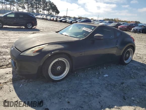✅ 2009 Nissan 370Z • VIN: JN1AZ44EX9M404083 • Lot: 91008375. Listed on Copart with 185,773 mi. Free auction sales archive from the USA and detailed vehicle history report at DreamBid. Image 1.