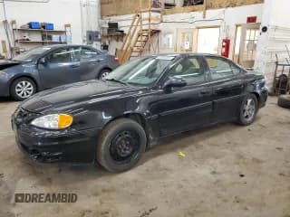 ✅ 2003 Pontiac Grand Am GT • VIN: 1G2NW52EX3M579719 • Lot: 49891365. Listed on Copart with 153,838 mi. Free auction sales archive from the USA and detailed vehicle history report at DreamBid. Image 1.