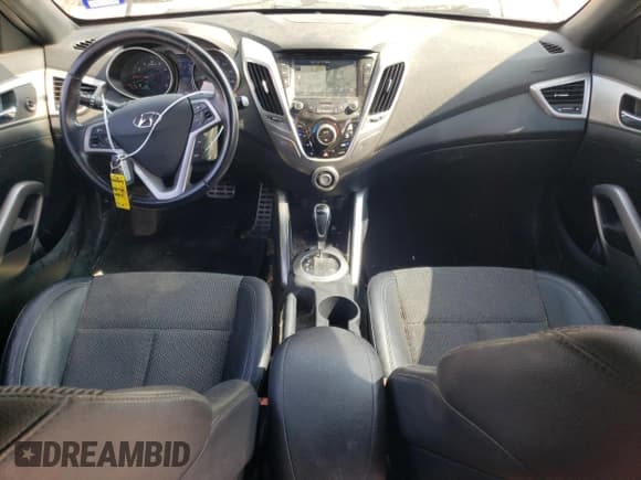 ✅ 2016 Hyundai Veloster • VIN: KMHTC6AD7GU276490 • Lot: 79127834. Wystawiony na Copart z przebiegiem 99 107 mil. Bezpłatny archiwum sprzedaży aukcyjnych z USA i szczegółowy raport historii pojazdu na DreamBid. Zdjęcie 8.