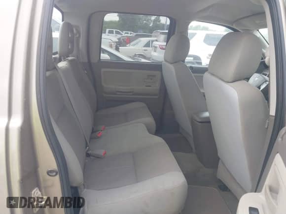 2006 Dodge Dakota SLT with VIN 1D7HE48N16S703072, listed as a IAAI auction lot 42156709 with 102,919 mi miles and . Bid and sale history available at DreamBid. Image 8.