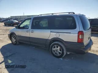 ✅ 2002 Pontiac Montana 1SX • VIN: 1GMDV03E72D193880 • Lot: 42328975. Listed on Copart with 86,980 mi. Free auction sales archive from the USA and detailed vehicle history report at DreamBid. Image 2.