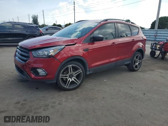 ✅ 2019 Ford Escape SEL • VIN: 1FMCU0HD7KUA88173 • Lot: 70126525. Listed on Copart with 95,789 mi. Free auction sales archive from the USA and detailed vehicle history report at DreamBid. Image 1.