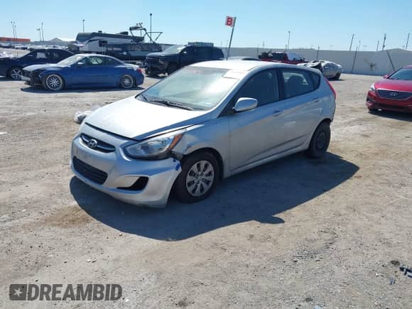 2015 Hyundai Accent GS with VIN KMHCT5AE6FU213107, listed as a IAAI auction lot 43430089 with 131,496 mi miles and . Bid and sale history available at DreamBid. Image 2.