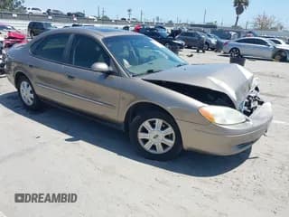 ✅ 2003 Ford Taurus SEL Deluxe • VIN: 1FAHP56S73A108396 • Лот: 42316288. Опубликован ранее на IAAI с пробегом 129 033 миль. Бесплатный доступ к архиву аукционных продаж из США и подробный отчёт об истории автомобиля на DreamBid. Изображение 1.