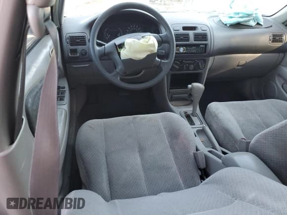 ✅ 2000 Toyota Corolla CE • VIN: 1NXBR12E2YZ392203 • Лот: 90441485. Опубликован ранее на Copart с пробегом Не указан. Бесплатный доступ к архиву аукционных продаж из США и подробный отчёт об истории автомобиля на DreamBid. Изображение 8.