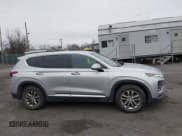✅ 2019 Hyundai Santa Fe SE • VIN: 5NMS2CAD7KH054274 • Lot: 43694931. Listed on IAAI with 96,329 mi. Free auction sales archive from the USA and detailed vehicle history report at DreamBid. Image 13.