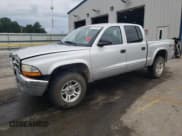 ✅ 2004 Dodge Dakota SLT • VIN: 1D7HG48N64S751657 • Lot: 70761615. Listed on Copart with 161,923 mi. Free auction sales archive from the USA and detailed vehicle history report at DreamBid. Image 1.