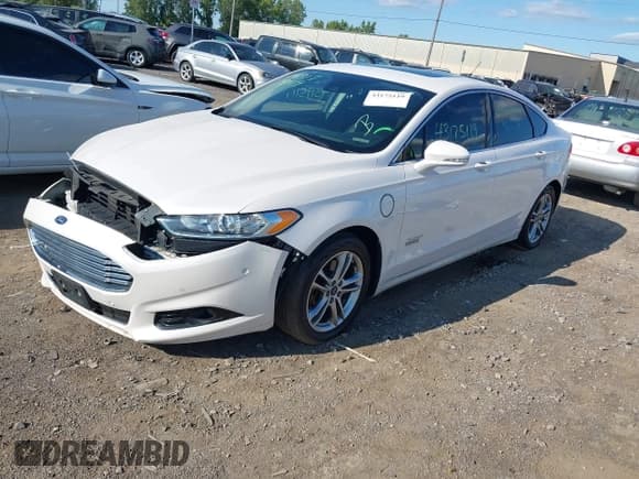 ✅ 2016 Ford Fusion Titanium • VIN: 3FA6P0SU6GR357415 • Lot: 43175119. Listed on IAAI with 92,373 mi. Free auction sales archive from the USA and detailed vehicle history report at DreamBid. Image 2.