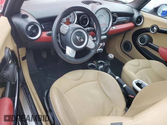2009 MINI Hardtop with VIN WMWMF33559TU70753, listed as a Copart auction lot 79898174 with 63,051 mi miles and Salvage title. Bid and sale history available at DreamBid. Image 8.