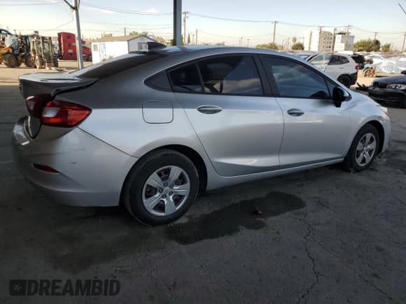 ✅ 2018 Chevrolet Cruze LS • VIN: 1G1BC5SM7J7134731 • Lot: 82364625. Listed on Copart with 84,754 mi. Free auction sales archive from the USA and detailed vehicle history report at DreamBid. Image 3.