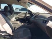 ✅ 2015 Chevrolet Impala LT • VIN: 2G1125S30F9108144 • Lot: 43450694. Listed on IAAI with 216,503 mi. Free auction sales archive from the USA and detailed vehicle history report at DreamBid. Image 5.