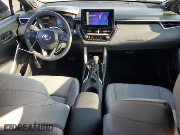 ✅ 2024 Toyota Corolla Cross Hybrid S • VIN: 7MUFBABG6RV030589 • Lot: 89919285. Listed on Copart with 27,154 mi. Free auction sales archive from the USA and detailed vehicle history report at DreamBid. Image 8.