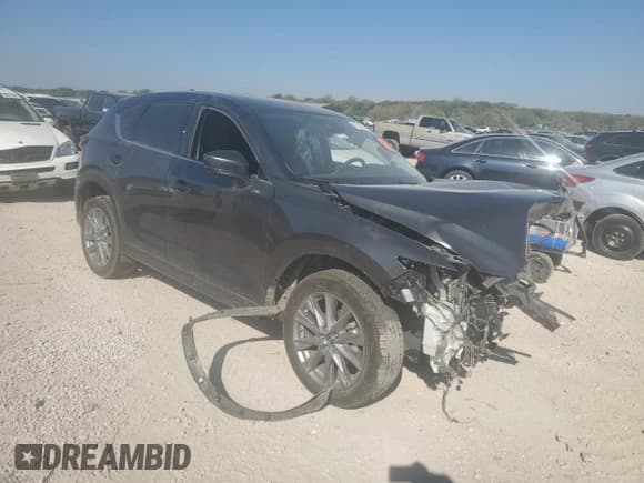 ✅ 2019 Mazda CX-5 Grand Touring • VIN: JM3KFADMXK0502549 • Lot: 87015825. Listed on Copart with Not provided. Free auction sales archive from the USA and detailed vehicle history report at DreamBid. Image 4.