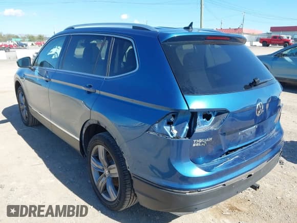 ✅ 2020 Volkswagen Tiguan SE • VIN: 3VV2B7AX0LM125607 • Lot: 43506953. Listed on IAAI with 80,746 mi. Free auction sales archive from the USA and detailed vehicle history report at DreamBid. Image 17.