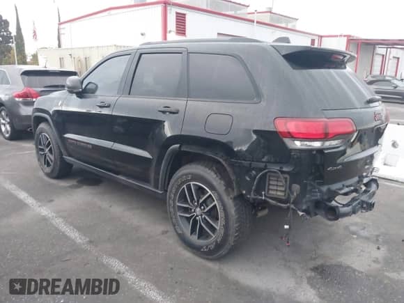 2017 Jeep Grand Cherokee Trailhawk with VIN 1C4RJFLG9HC631016, listed as a IAAI auction lot 43352680 with 82,773 mi miles and . Bid and sale history available at DreamBid. Image 3.