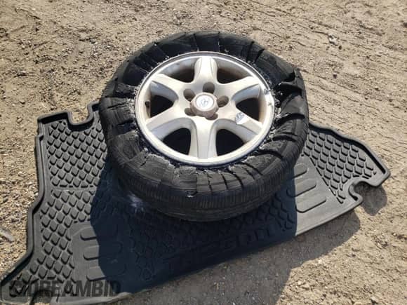 2005 Hyundai Tucson GLS z VIN KM8JN12DX5U212587, wystawiony jako Copart lot #72044114 z przebiegiem 128 993 mil mil oraz Szkoda całkowita • Salvage title. Historia ofert i sprzedaży dostępna na DreamBid. Obrazek 14.