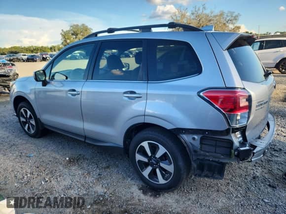 2017 Subaru Forester Limited with VIN JF2SJARC4HH510116, listed as a Copart auction lot 82122265 with 87,527 mi miles and Salvage title. Bid and sale history available at DreamBid. Image 2.