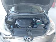 ✅ 2017 Hyundai Veloster Value Edition • VIN: KMHTC6AD4HU309804 • Lot: 43441272. Wystawiony na IAAI z przebiegiem 99 124 mil. Bezpłatny archiwum sprzedaży aukcyjnych z USA i szczegółowy raport historii pojazdu na DreamBid. Zdjęcie 10.