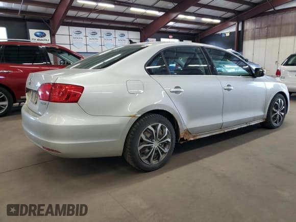 ✅ 2013 Volkswagen Jetta SE • VIN: 3VWDP7AJ2DM446700 • Lot: 80859175. Listed on Copart with 212,709 mi. Free auction sales archive from the USA and detailed vehicle history report at DreamBid. Image 3.