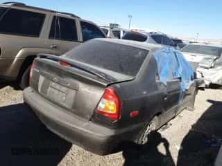 2002 Hyundai Accent GL с VIN KMHCG45C92U305295, выставлен на аукционе Copart как лот 43836105 с пробегом 92 435 миль миль и На запчасти • Non repairable. История ставок и продаж доступна на DreamBid. Изображение 3.