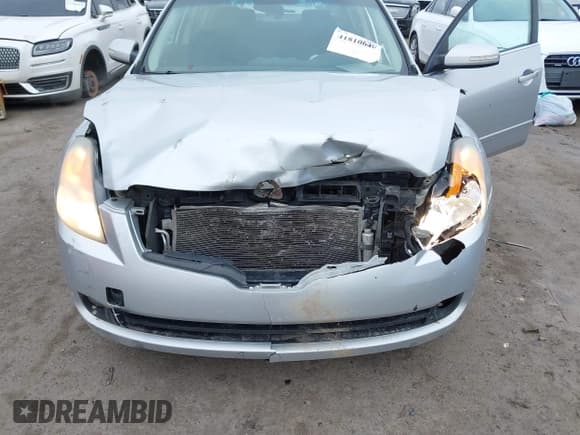 ✅ 2007 Nissan Altima SL • VIN: 1N4BL21E37C170017 • Лот: 41810640. Опубликован ранее на IAAI с пробегом 182 269 миль. Бесплатный доступ к архиву аукционных продаж из США и подробный отчёт об истории автомобиля на DreamBid. Изображение 6.