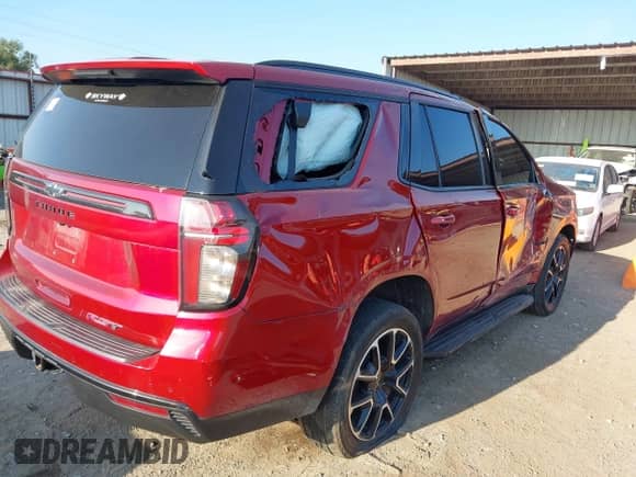 2021 Chevrolet Tahoe RST z VIN 1GNSKRKD0MR421104, wystawiony jako IAAI lot #43209576 z przebiegiem 93 123 mil mil oraz . Historia ofert i sprzedaży dostępna na DreamBid. Obrazek 4.