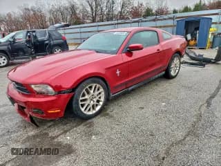 ✅ 2012 Ford Mustang Premium • VIN: 1ZVBP8AM2C5267875 • Lot: 93328885. Listed on Copart with 138,681 mi. Free auction sales archive from the USA and detailed vehicle history report at DreamBid. Image 1.