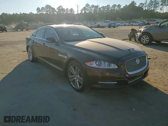 ✅ 2011 Jaguar XJ • VIN: SAJWA1CB6BLV06221 • Lot: 91406675. Listed on Copart with 106,240 mi. Free auction sales archive from the USA and detailed vehicle history report at DreamBid. Image 13.