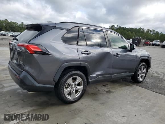 ✅ 2022 Toyota RAV4 Hybrid XLE • VIN: JTMRWRFV5ND562988 • Лот: 86077865. Опубликован ранее на Copart с пробегом 87 183 миль. Бесплатный доступ к архиву аукционных продаж из США и подробный отчёт об истории автомобиля на DreamBid. Изображение 3.