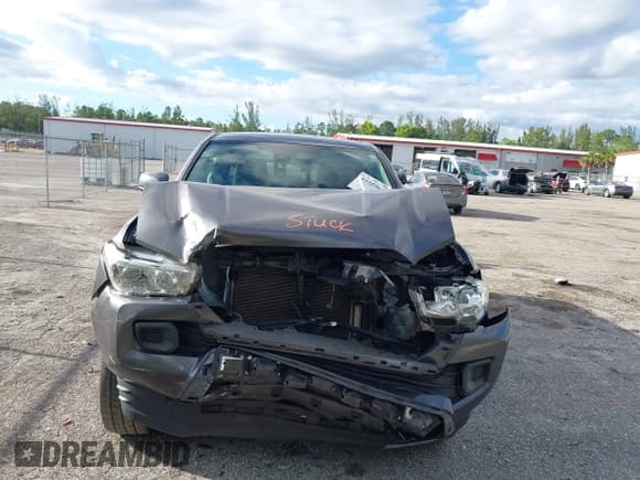✅ 2020 Toyota Tacoma SR5 • VIN: 5TFAX5GN7LX180619 • Lot: 43459642. Listed on IAAI with 141,205 mi. Free auction sales archive from the USA and detailed vehicle history report at DreamBid. Image 6.