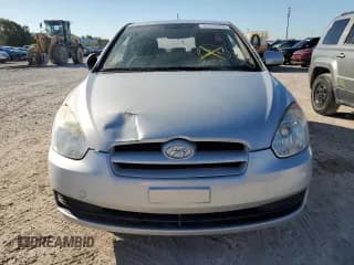 ✅ 2010 Hyundai Accent GS • VIN: KMHCM3AC9AU165045 • Лот: 76375884. Опубликован ранее на Copart с пробегом 69 684 миль. Бесплатный доступ к архиву аукционных продаж из США и подробный отчёт об истории автомобиля на DreamBid. Изображение 5.