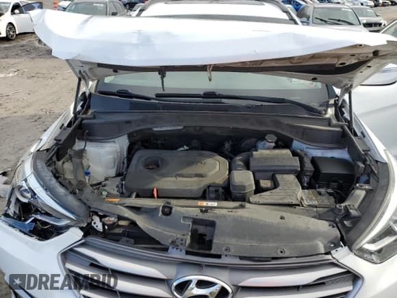 ✅ 2017 Hyundai Santa Fe 2.4L • VIN: 5NMZU3LBXHH019189 • Lot: 70523522. Listed on Copart with 84,038 mi. Free auction sales archive from the USA and detailed vehicle history report at DreamBid. Image 12.