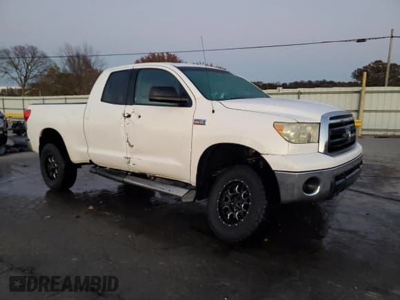 ✅ 2010 Toyota Tundra • VIN: 5TFUY5F11AX112421 • Lot: 92582615. Listed on Copart with 154,153 mi. Free auction sales archive from the USA and detailed vehicle history report at DreamBid. Image 4.