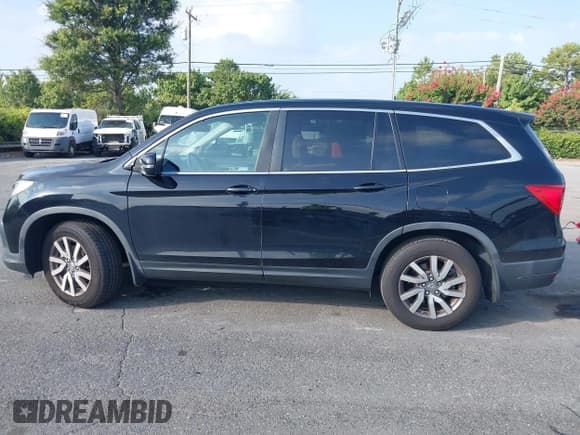 ✅ 2019 Honda Pilot EX-L • VIN: 5FNYF5H53KB000917 • Lot: 42789596. Listed on IAAI with 173,626 mi. Free auction sales archive from the USA and detailed vehicle history report at DreamBid. Image 14.