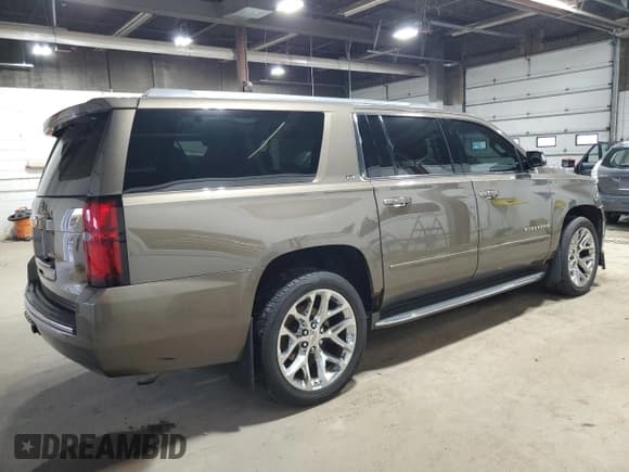 ✅ 2015 Chevrolet Suburban LTZ • VIN: 1GNSKKKCXFR723694 • Lot: 81478045. Listed on Copart with 218,436 mi. Free auction sales archive from the USA and detailed vehicle history report at DreamBid. Image 3.