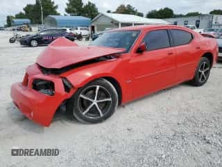 2010 Dodge Charger SXT with VIN 2B3CA3CVXAH228122, listed as a Copart auction lot 63802564 with 198,249 mi miles and Salvage title. Bid and sale history available at DreamBid. Image 1.