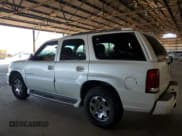 ✅ 2003 Cadillac Escalade • VIN: 1GYEK63N03R145754 • Lot: 82171295. Wystawiony na Copart z przebiegiem 186 302 mil. Bezpłatny archiwum sprzedaży aukcyjnych z USA i szczegółowy raport historii pojazdu na DreamBid. Zdjęcie 2.