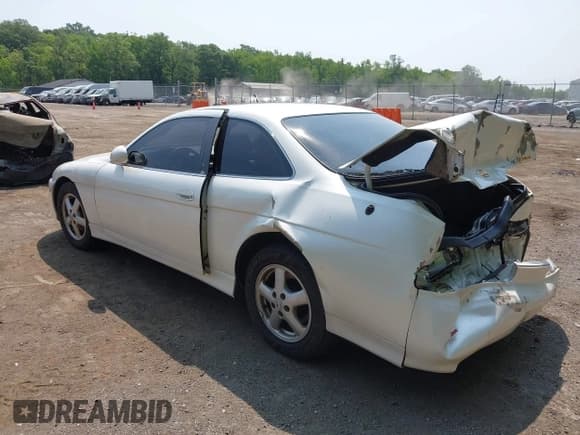 ✅ 1997 Lexus SC 400 • VIN: JT8CH32Y0V0053216 • Lot: 42487129. Wystawiony na IAAI z przebiegiem 158 574 mil. Bezpłatny archiwum sprzedaży aukcyjnych z USA i szczegółowy raport historii pojazdu na DreamBid. Zdjęcie 3.