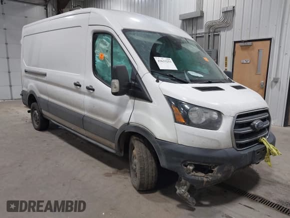 ✅ 2020 Ford Transit Cargo • VIN: 1FTBR1C88LKB56656 • Lot: 43633253. Listed on IAAI with 121,968 mi. Free auction sales archive from the USA and detailed vehicle history report at DreamBid. Image 1.