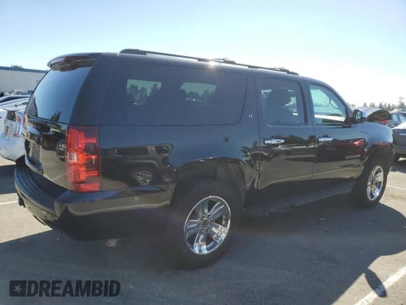 2013 Chevrolet Suburban LT с VIN 1GNSCJE06DR100546, выставлен на аукционе Copart как лот 86519335 с пробегом 192 147 миль миль и Списание • Salvage title. История ставок и продаж доступна на DreamBid. Изображение 3.