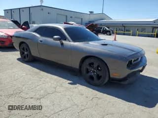 ✅ 2014 Dodge Challenger SXT • VIN: 2C3CDYAG7EH277327 • Lot: 72247414. Wystawiony na Copart z przebiegiem 158 241 mil. Bezpłatny archiwum sprzedaży aukcyjnych z USA i szczegółowy raport historii pojazdu na DreamBid. Zdjęcie 4.