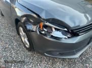 ✅ 2012 Volkswagen Jetta TDI • VIN: 3VWLL7AJ6CM428576 • Лот: 91666905. Опубликован ранее на Copart с пробегом 195 753 миль. Бесплатный доступ к архиву аукционных продаж из США и подробный отчёт об истории автомобиля на DreamBid. Изображение 12.