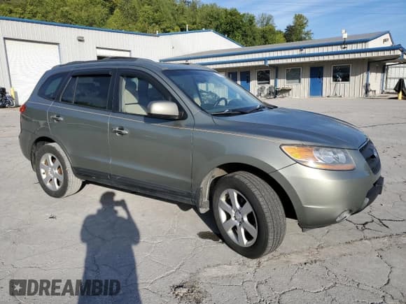✅ 2009 Hyundai Santa Fe SE • VIN: 5NMSH73E69H315402 • Lot: 70574574. Listed on Copart with 147,732 mi. Free auction sales archive from the USA and detailed vehicle history report at DreamBid. Image 4.