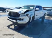 ✅ 2021 Toyota Tacoma SR5 • VIN: 3TMAZ5CN0MM151647 • Lot: 41309352. Listed on IAAI with 128,181 mi. Free auction sales archive from the USA and detailed vehicle history report at DreamBid. Image 18.