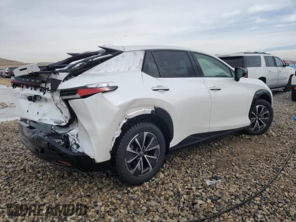 ✅ 2024 Lexus RZ 450e Premium • VIN: JTJAAAAB8RA023618 • Lot: 43230375. Listed on Copart with 8,307 mi. Free auction sales archive from the USA and detailed vehicle history report at DreamBid. Image 3.